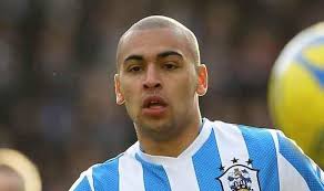 Huddersfield striker James Vaughan sealed an impressive win for Huddersfield as the Terriers sealed an impressive 3-1 at Millwall