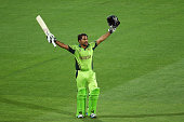 Pakistan's Sarfraz Ahmed raise his bat aloft after helping Pakistan to a seven wicket win. over Ireland. The win against Ireland means they will now play hosts Australia in the quarter final.